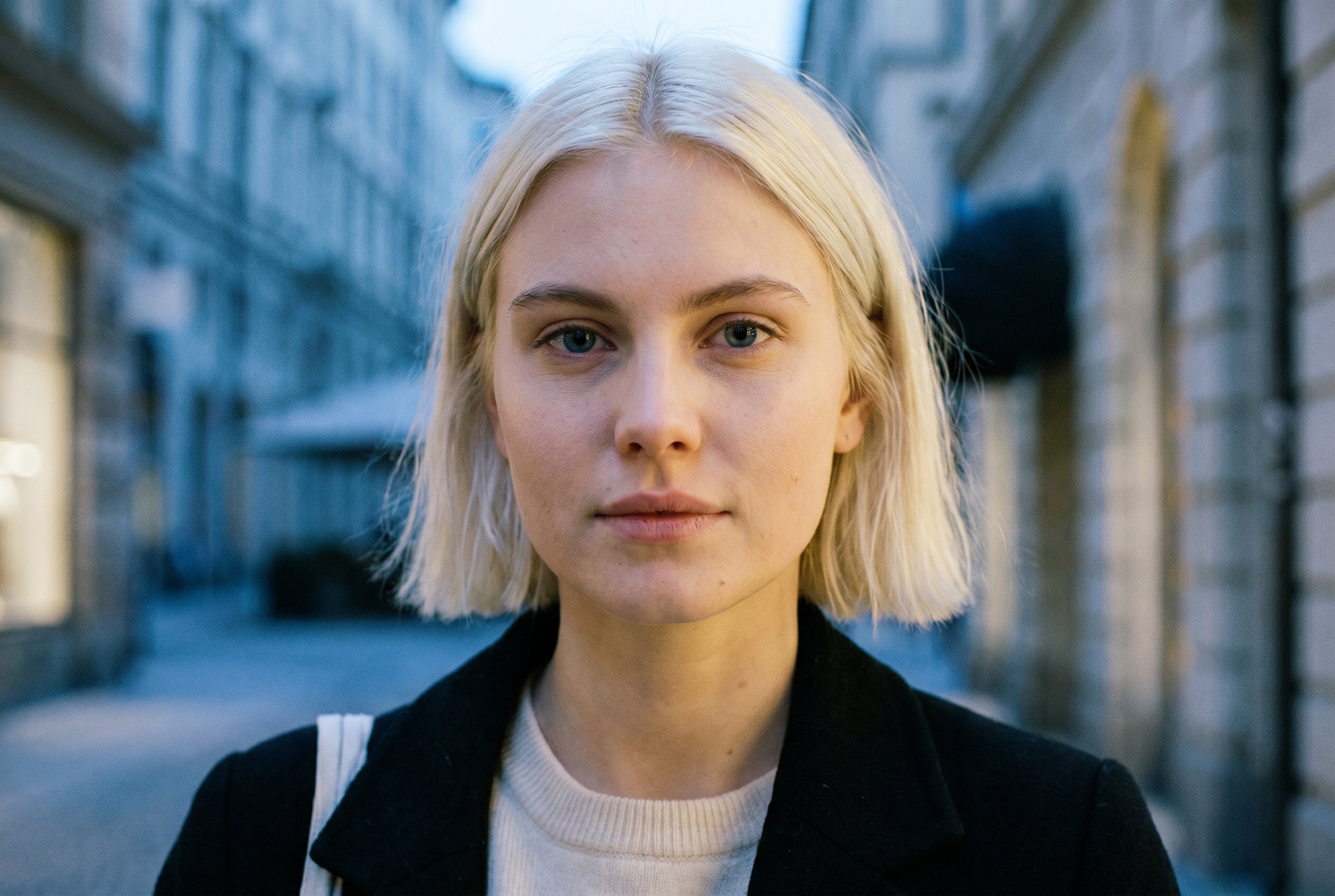 Portrait — Stella, tight head-and-shoulders, the Subject-Lock face-reference for the wider context-frames below