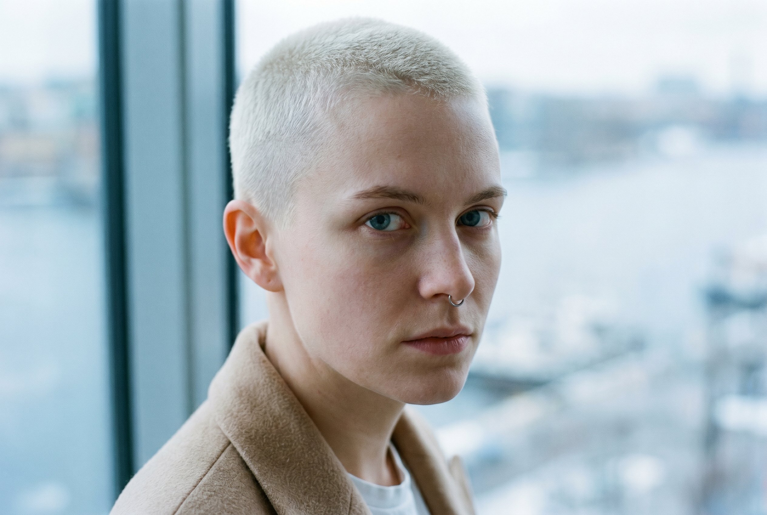 Portrait — Maja, tight head-and-shoulders, the Subject-Lock face-reference for the wider context-frames below